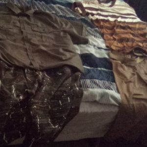 Dark green shirt camouflage shorts